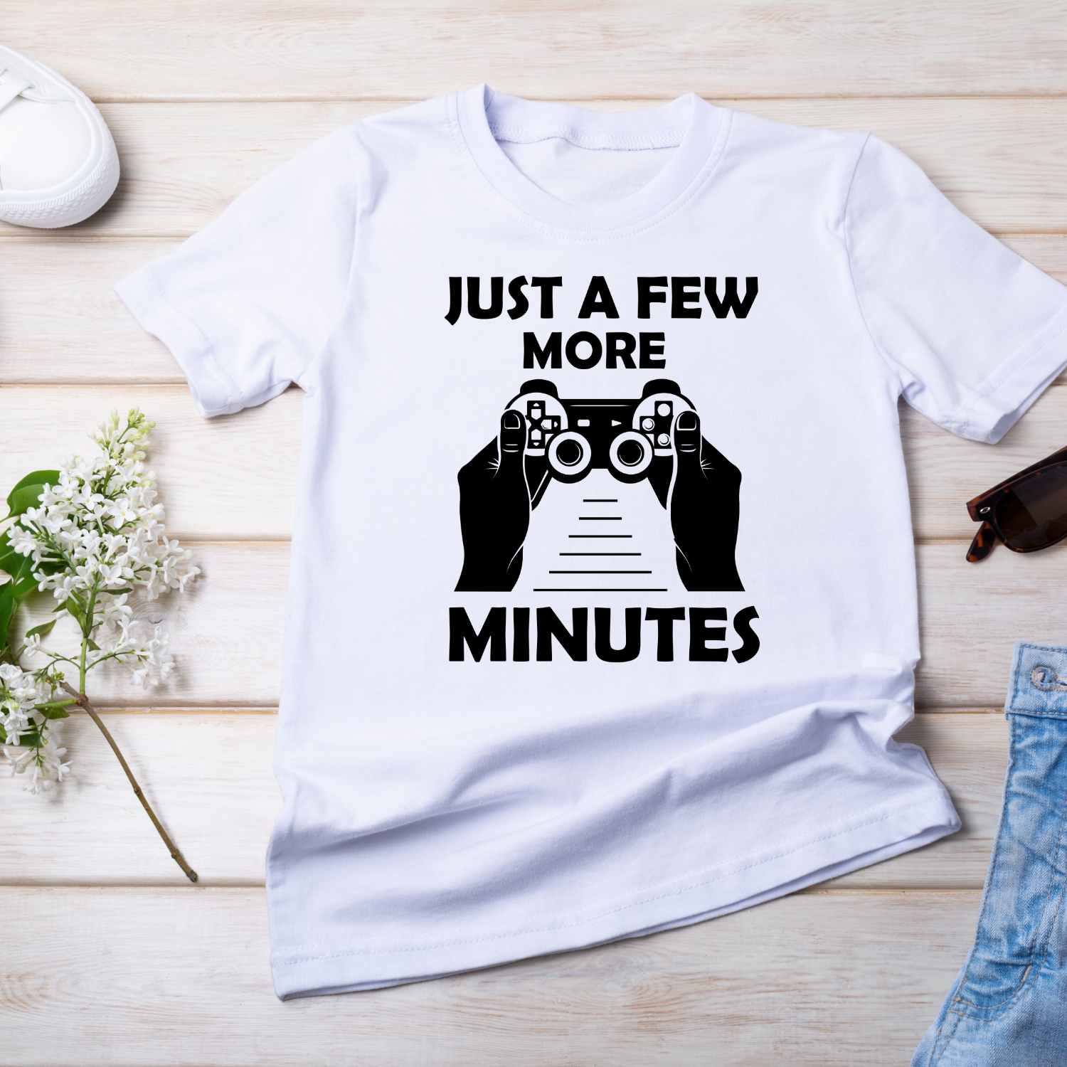 "Gear up for gaming with our 'Just a Few More Minutes' t-shirt design. Don't wait, level up your style now! Go grab yours today!"